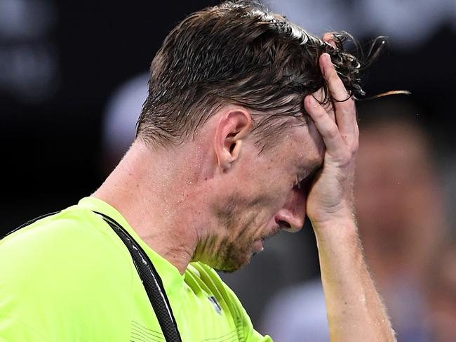 John Millman of Australia leaves the court following his second round loss to Grigor Dimitrov of Bulgaria at the Brisbane International Tennis Tournament in Brisbane, Thursday, January 4, 2018. (AAP Image/Dave Hunt) NO ARCHIVING, EDITORIAL USE ONLY