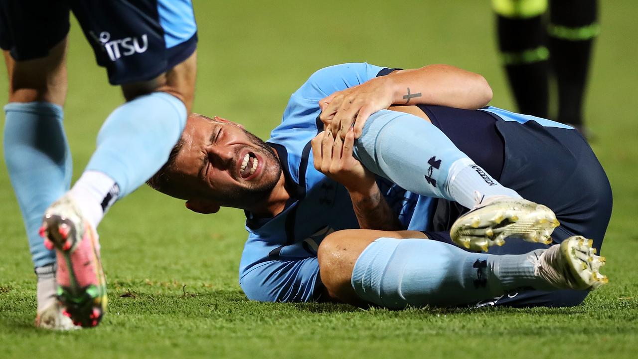 Chris Zuvela holds his kneeafter going down in Sydney’s A-League win over Wellington on Monday. Picture: Mark Kolbe/Getty Images