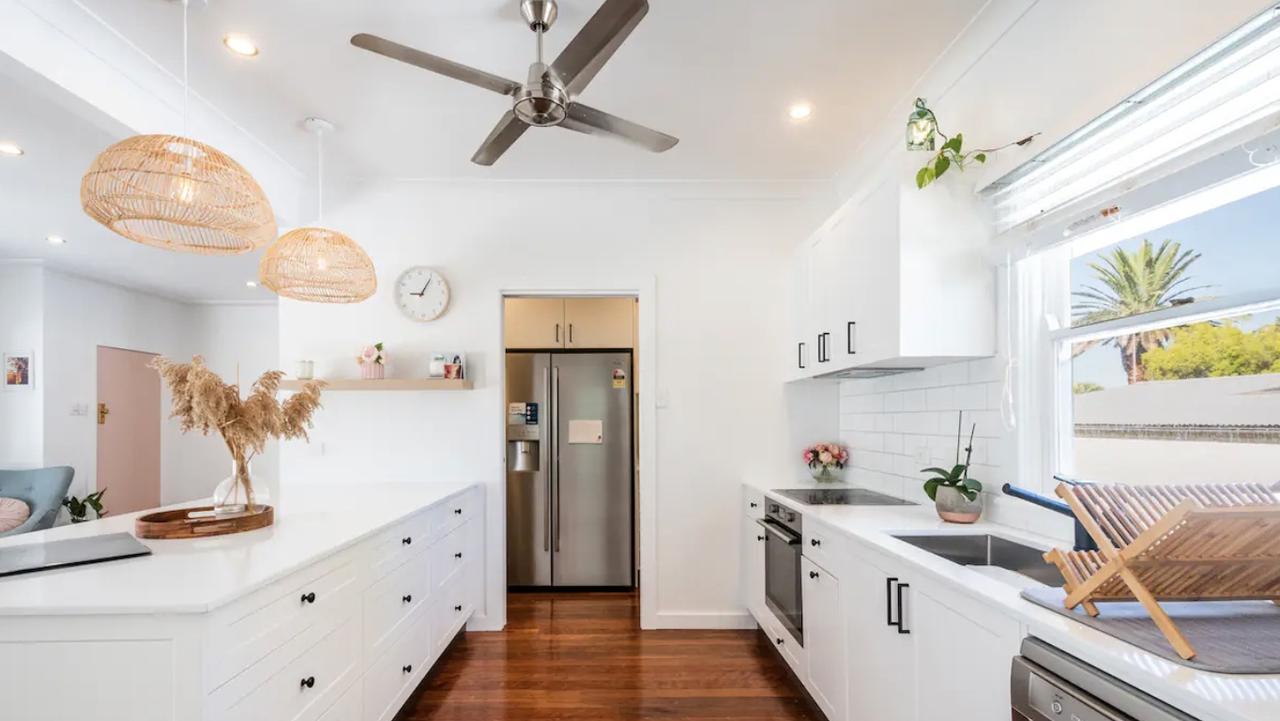 This Grafton home pays tribute to its federation heritage while incorporating modern elements in its renovation, including beautifully polished timber floorboards.