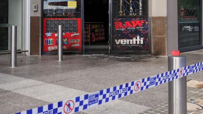 Police tape at the entrance to the store on Friday morning. Picture: Ian Currie