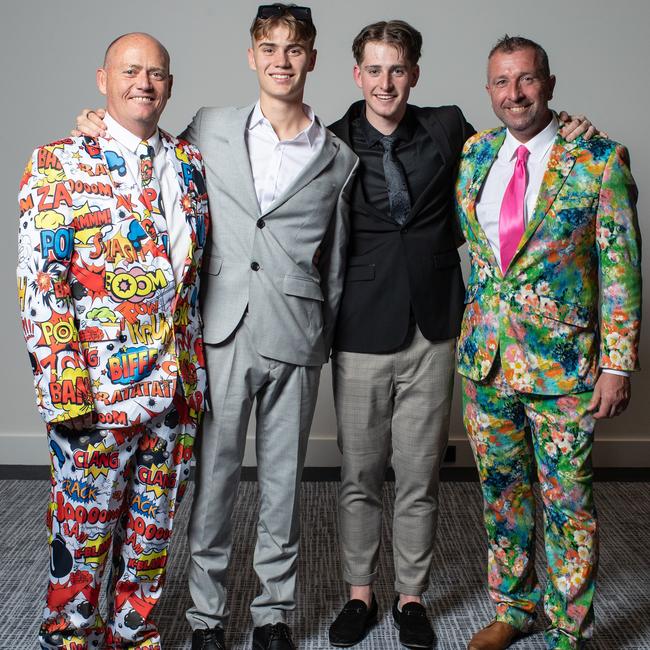 David Mason with his son Jack and Lachlan Cahill with his father Derek.