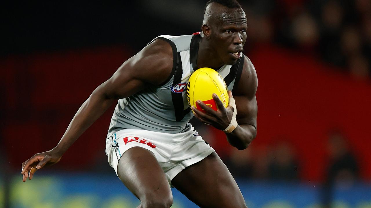 MELBOURNE, AUSTRALIA – AUGUST 14: Aliir Aliir of the Power in action during the 2022 AFL Round 22 match between the Essendon Bombers and the Port Adelaide Power at Marvel Stadium on August 14, 2022 in Melbourne, Australia. (Photo by Michael Willson/AFL Photos via Getty Images)