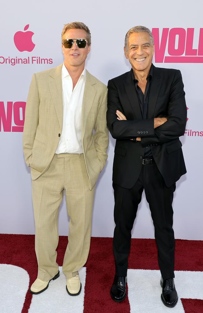 Hollywood heavyweights Brad Pitt and George Clooney were suited up for the LA Premiere of their latest film Wolfs. Picture: Kevin Winter/Getty Images