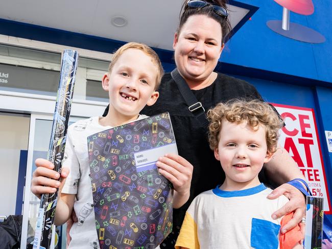 Year 3 at St Francis of Assisi Primary Hamish, 8, Rebecca and Henry McHugh, 4, buying school supplies at Officeworks in Croydon, on Sunday, January 7, 2023. (The Advertiser/ Morgan Sette)