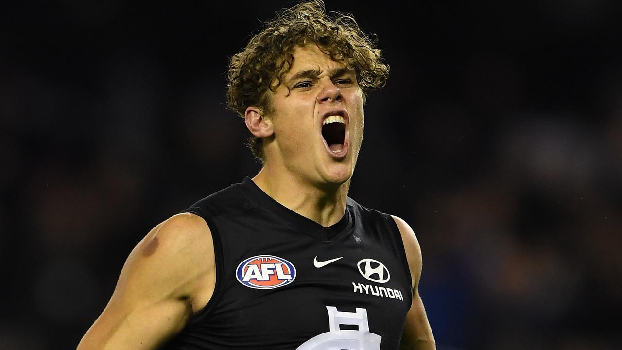 Charlie Curnow of the Blues reacts after kicking a goal during the Round 13 AFL match between the Carlton Blues and the Western Bulldogs at Marvel Stadium in Melbourne, Saturday, June 15, 2019.  (AAP Image/Julian Smith) NO ARCHIVING, EDITORIAL USE ONLY