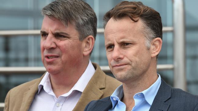 Melbourne Racing Club CEO Josh Blanksby, right, seen here with former Racing Victoria CEO Giles Thompson is banking on big crowds. Picture: Vince Caligiuri