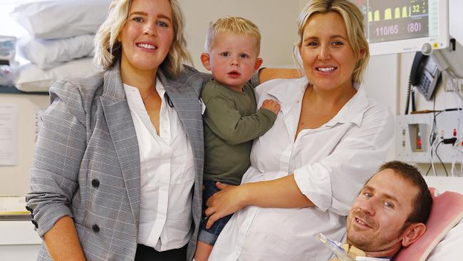 Kate Stapleton (2nd from right) with husband Nathan and son Harry at Prince of Wales hospital Picture: Sam Ruttyn