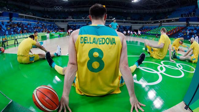 RIO DE JANEIRO, BRAZIL — AUGUST 14: Matthew Dellavedova #8 and members of the Australian team stretch prior to the preliminary round game against Venezuela at the Rio 2016 Olympic Games on August 14, 2016 in Rio de Janeiro, Brazil. (Photo by Jamie Squire/Getty Images)