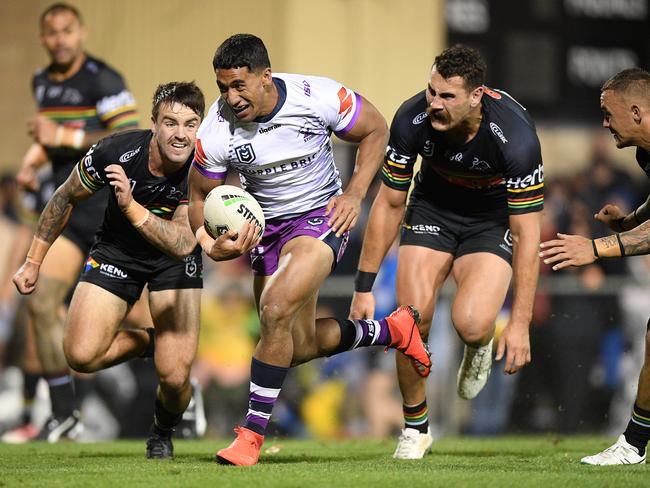 Marion Seve of the Storm makes a break to score a try during the Round 3 NRL match between the Penrith Panthers and Melbourne Storm. Picture: AAP