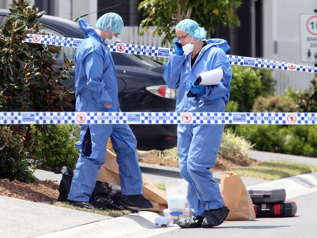 Police forensics officers investigating at the scene of Shane Bowden’s killing. Picture: Richard Gosling.