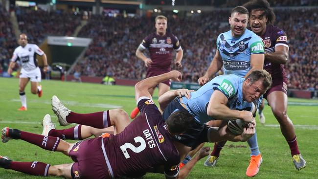 BRISBANE, AUSTRALIA - JUNE 05: Josh Morris of the Blues scores a try during game one of the 2019 State of Origin series between the Queensland Maroons and the New South Wales Blues at Suncorp Stadium on June 05, 2019 in Brisbane, Australia. (Photo by Chris Hyde/Getty Images)