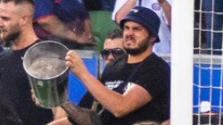 Agelopoulos was caught on video hurling a bucket of sand at goalkeeper Tom Glover. Picture: Victoria Police.