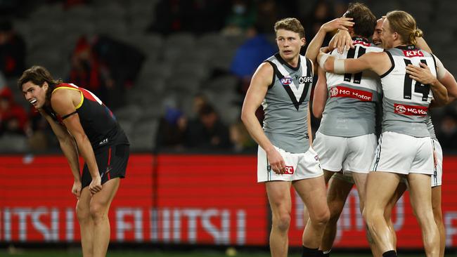 Port Adelaide players mob Sam Powell-Pepper after another goal. Picture: Daniel Pockett/Getty Images