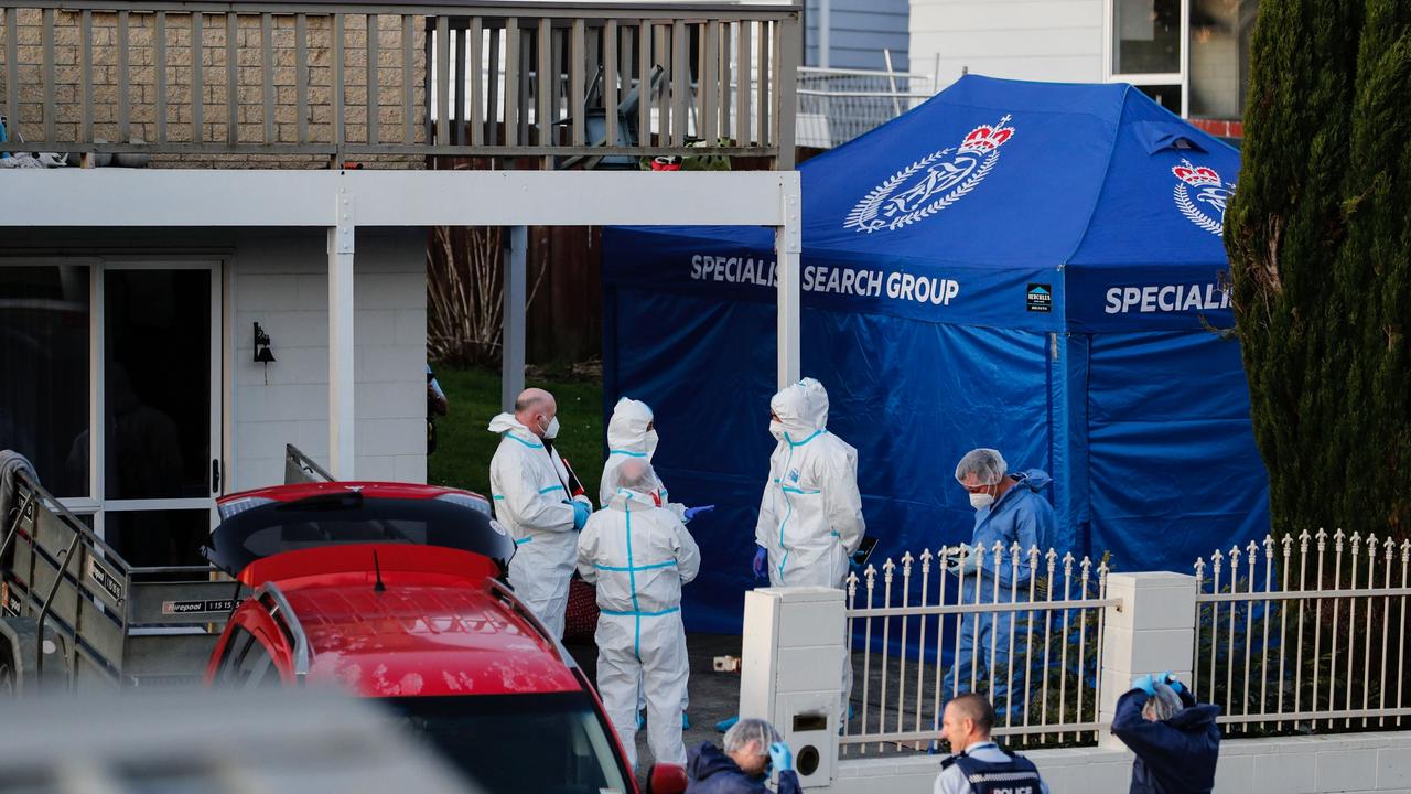 Police investigate after human remains were found in suitcases. Picture: Dean Purcell/NZ Herald