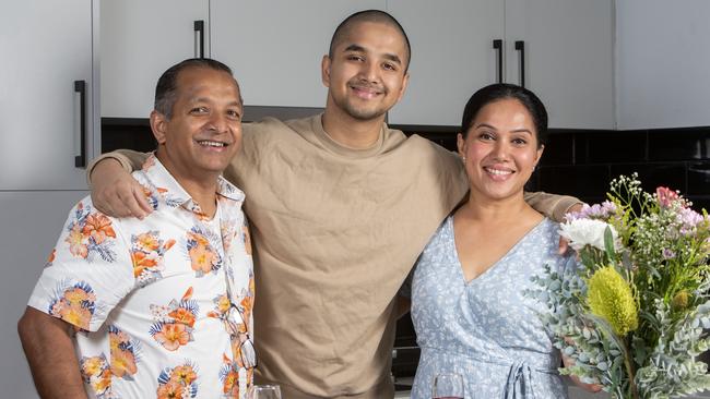 The Jayasinghe family is cherishing time together this New Year. Vinuka, 17, pictured in the middle with dad Ravi and mum Surangee is hoping to be accepted into the Army, older sister Sayuni, 20, (not pictured), is currently living and studying in Melbourne. Picture Emma Brasier.