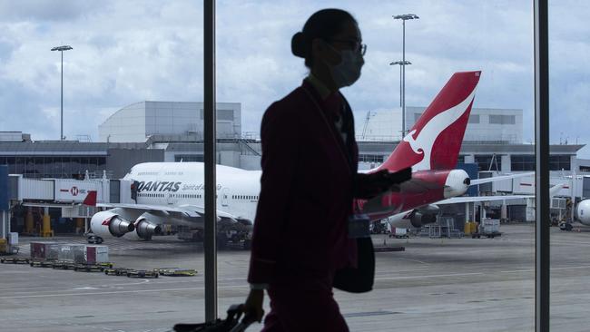 Planes stand idle at Sydney airport. Picture: John Feder