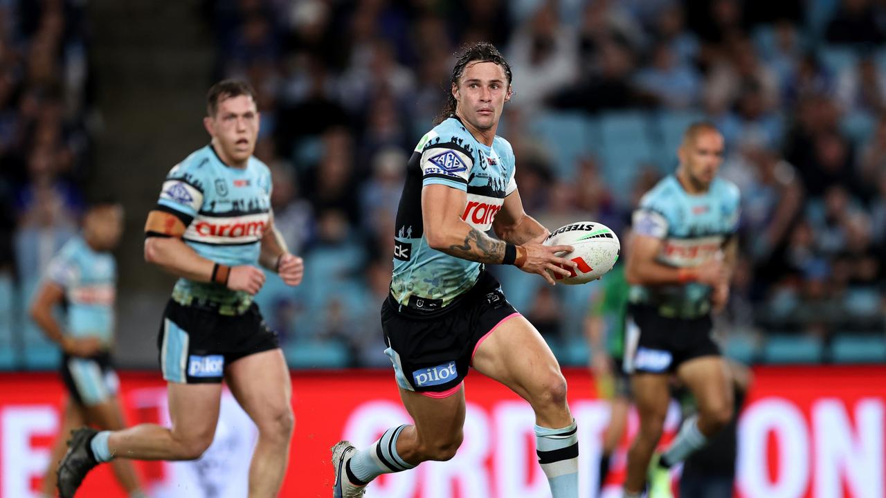 SYDNEY, AUSTRALIA - APRIL 22: Nicholas Hynes of the Sharks runs the ball during the round eight NRL match between Canterbury Bulldogs and Cronulla Sharks at Accor Stadium on April 22, 2023 in Sydney, Australia. (Photo by Brendon Thorne/Getty Images)