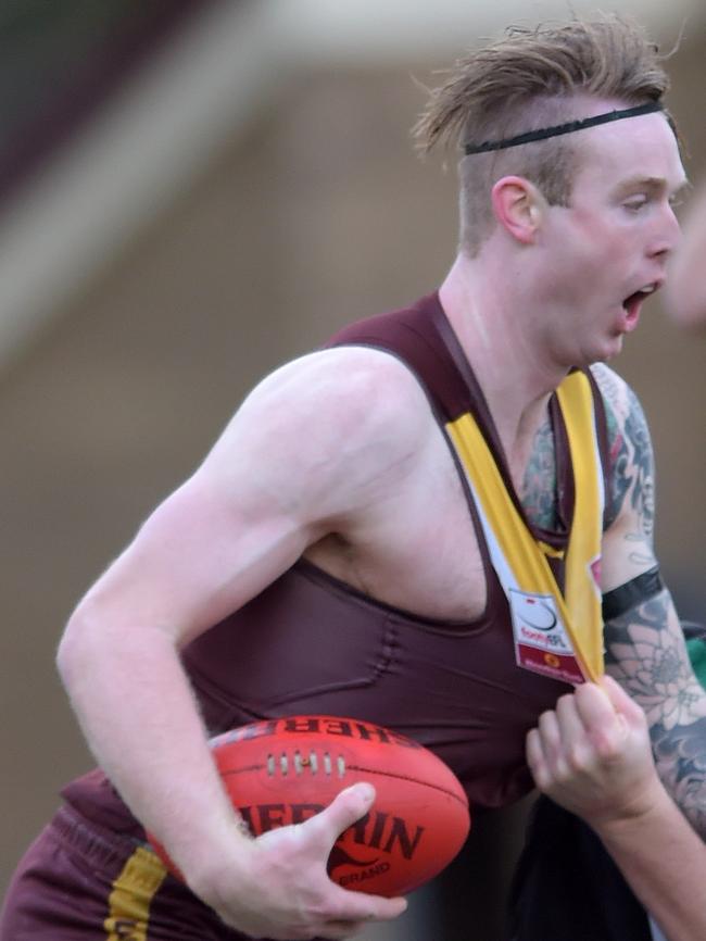 Jarrod Lake is brought to ground in a tackle. Picture: Steve Tanner