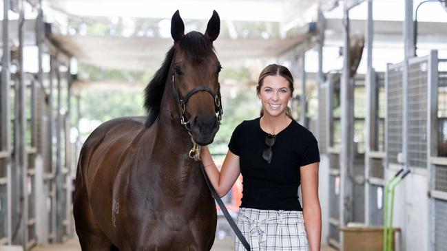 Hannah Jennings with Invincible Woman ahead of Magic Millions Race Day. Picture: Luke Marsden