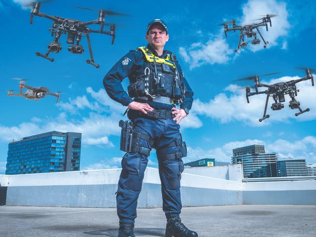 First Constable Andrew Lahman welcomes Victoria Police’s growing drone arsenal. Picture: Jake Nowakowski (digitally altered image)