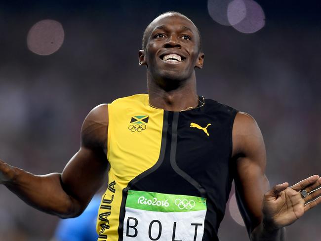 RIO DE JANEIRO, BRAZIL - AUGUST 14: Usain Bolt of Jamaica wins the Men's 100m Final on Day 9 of the Rio 2016 Olympic Games at the Olympic Stadium on August 14, 2016 in Rio de Janeiro, Brazil. (Photo by Shaun Botteril/Getty Images) *** BESTPIX ***