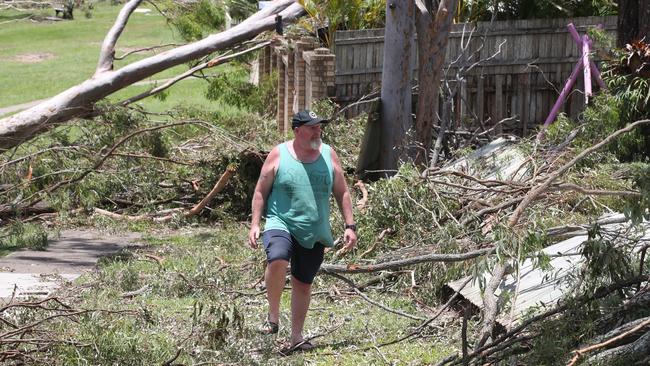 Paul Boyton surveys the damage to his Helensvale property. Picture Glenn Hampson