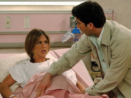 Actor Jennifer Aniston with David Schwimmer in scene from TV program "Friends". /TV/program/Titles/Friends