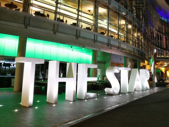 The Star casino, operated by Echo Entertainment Group Ltd., stands illuminated at night in Sydney, Australia, on Monday, Aug. 10, 2015. Echo Entertainment is scheduled to report full-year results on Aug. 12. Photographer: Brendon Thorne/Bloomberg