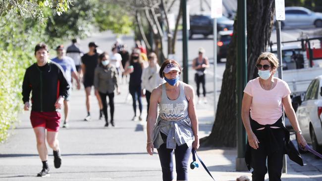 Melburnians get out for their daily exercise on the Tan. Picture: NCA NewsWire/ David Crosling