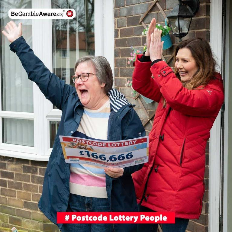 Christine screamed with happiness when her £166,666 (AUD $323,333) cheque was revealed. Picture: People's Postcode Lottery