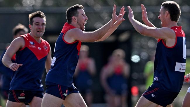 NFL: Nathan Searl and Sam Gleeson celebrate a goal for Diamond Creek. Picture: Andy Brownbill