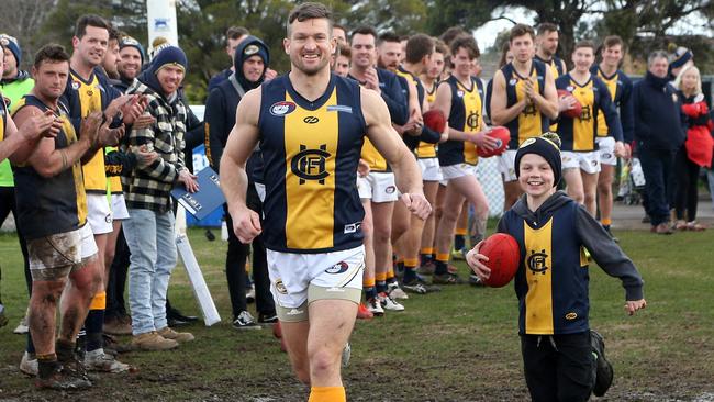 Daniel Keenan runs out for his 400th game. Picture: Hamish Blair