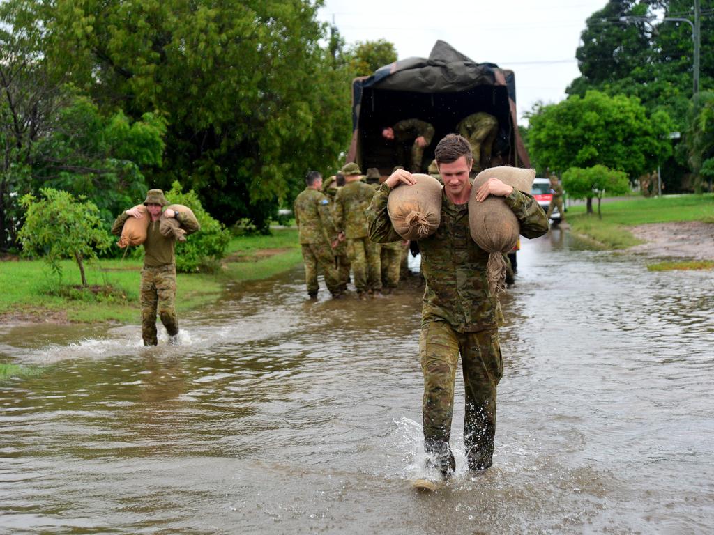 Gunner Rex Keough and comrades deploy to Railway Estate to sandbag properties. Picture: Evan Morgan