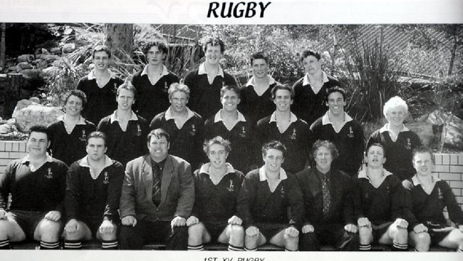 The St Laurence’s College first XV. Cooper Cronk in the front row, fourth from right.