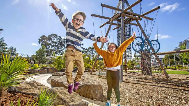 Annabelle, 7, and Seth, 5, are enjoying the reopening of playgrounds. Picture: Tim Carrafa