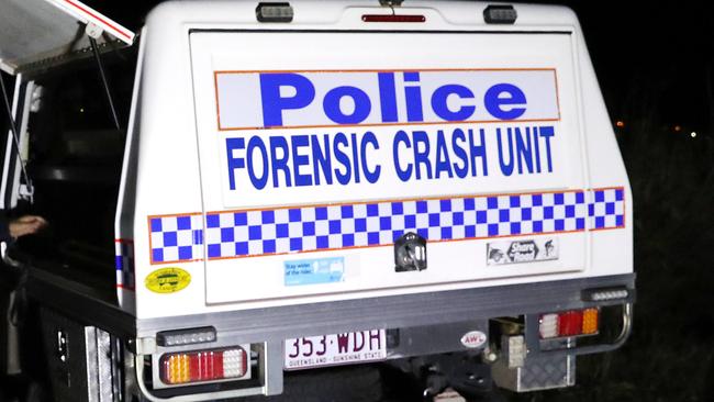 Sergeant Scott Ezard, from the Cairns Forensic Crash Unit, inspects an area where a motor cross rider was involved in a fatality. PICTURE: JUSTIN BRIERTY