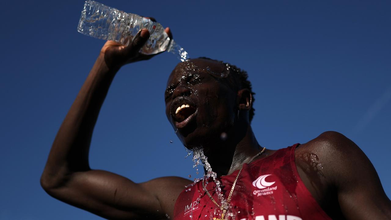 Gout Gout cools off after his victory. (Photo by Cameron Spencer/Getty Images)