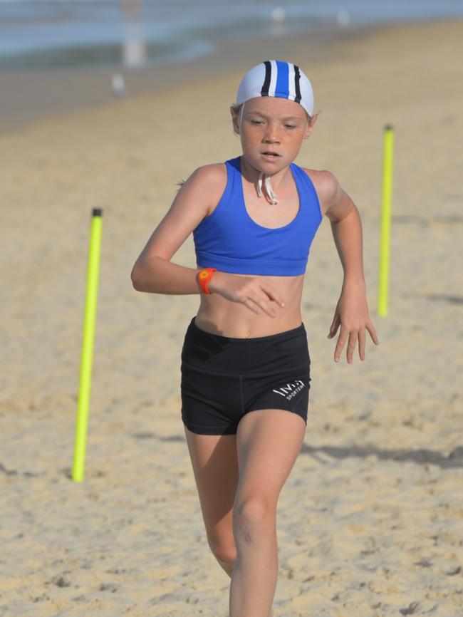 Running action at the Queensland Youth Surf Life Saving Championships on February 17.