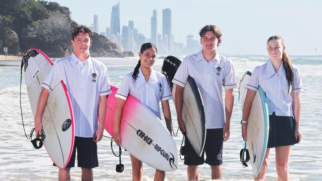 Members of the Miami State High Surfing squad who hope to be competing at the Australian interschool surfing championships. From left they are Brodie Scott 16, Kauri Hueston-Connor 15, Ryder Payne 16, and Emma Ryan 16. Picture Glenn Hampson