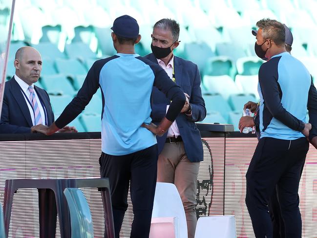 Cricket Australia CEO Nick Hockley and Cricket Australia Head of Integrity and Security Sean Carroll speak with Indian team management after Day 3 of the Third Test at the SCG. Picture: Getty Images