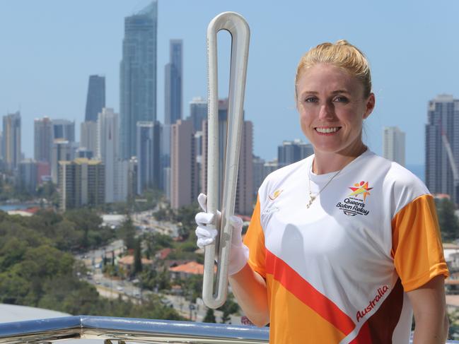 The Gold Coast 2018 Commonwealth Games (GC2018) Queen's Baton design and the International Sector of the GC2018 QueenÕs Baton Relay (QBR) was revealed at Jupiters Gold Coast on Sunday 20 November. Games ambassador and athlete Sally Pearson with the Queens Baton looking over the Gold Coast. Picture Glenn Hampson