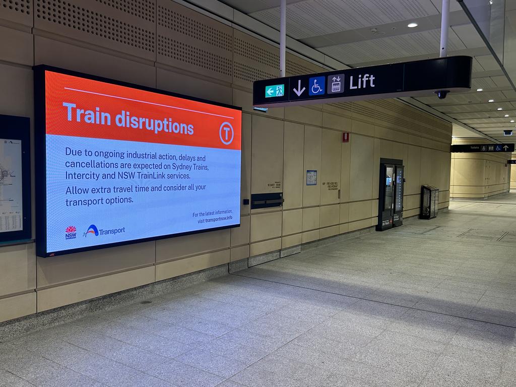 Illuminated signs at Martin Place station are warning commuters of the coming disruption.