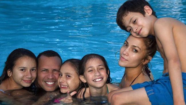 Ready to be a bride again, Jennifer Lopez plays happy families with her man Alex Rodriguez and his kids... 