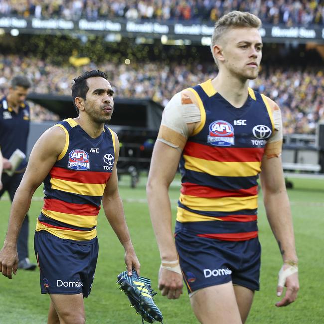 AFL - Grand Final - Adelaide Crows v Richmond Tigers at the MCG. Eddie Betts walks off with Hugh Greenwood. Picture Sarah Reed