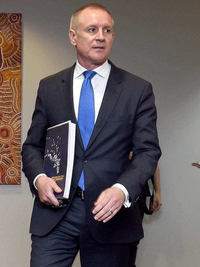 Premier Jay Weatherill with the commission’s Nuclear Fuel Cycle report. Pic: Naomi Jellicoe