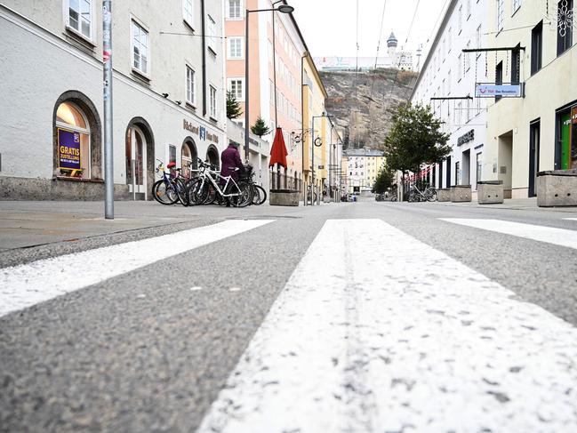 A deserted shopping street is seen in the Austrian city of Salzburg as the country returns to a nationwide partial lockdown. Picture: AFP