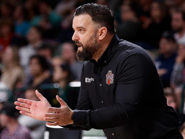 PERTH, AUSTRALIA - SEPTEMBER 21: Adam Forde Head Coach of the Taipans talks to the players during the round one NBL match between Cairns Taipans and Illawarra Hawks at HBF Stadium, on September 21, 2024, in Perth, Australia. (Photo by James Worsfold/Getty Images)