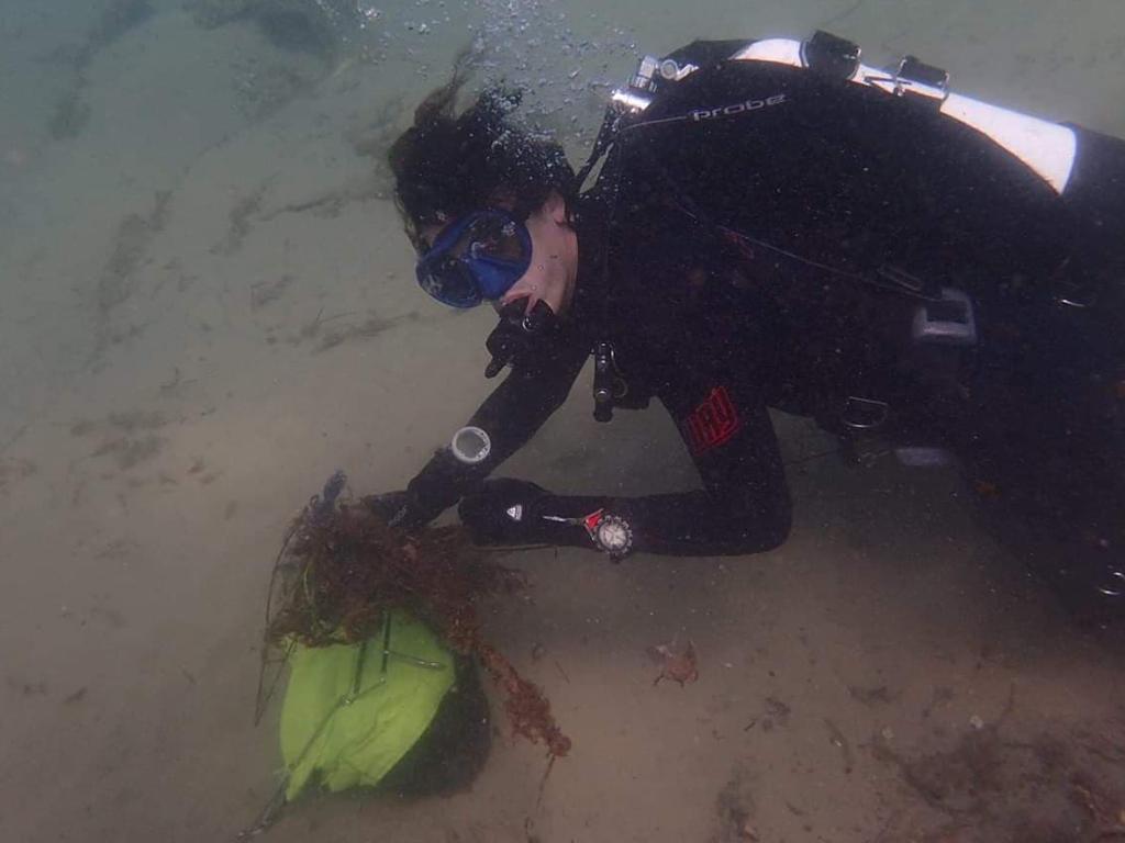 Environmental divers clean up the Gold Coast Seaway. This year they removed 1.75 tonnes from the waterways. Picture: supplied