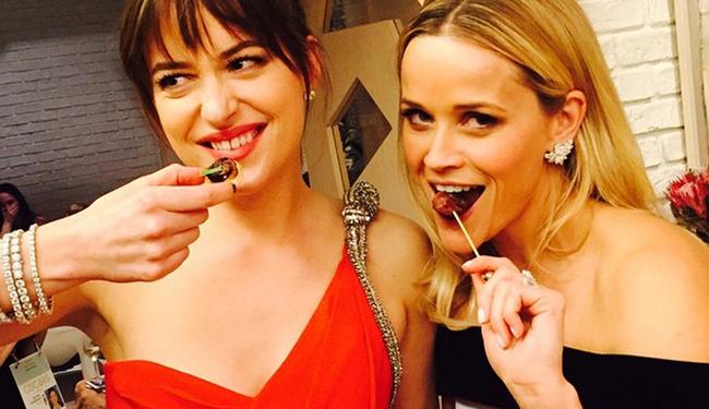 Reese Witherspoon at an Oscars party 2015 via Instagram, 50 shades of #grazing... #Horsdoeuvres #AboutLastNight #Oscars #DakotaJohnson