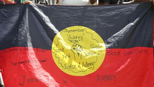 A flag waved at a big protest in Mareeba on Monday in response to the shooting of Aubrey Donahue. Picture: Peter Carruthers